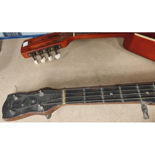 279 - A vintage 5 string banjo and two vintage mandolins