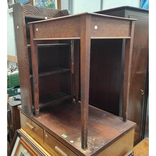 928 - An oak bookcase, a pine square table and a painted rocking chair