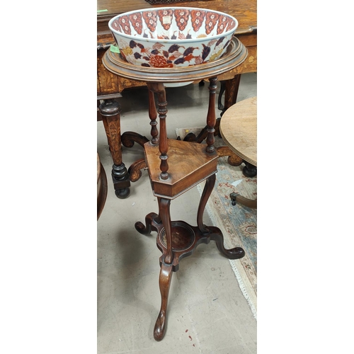 931 - A 19th century 3 tier circular washstand with later Imari pattern bowl