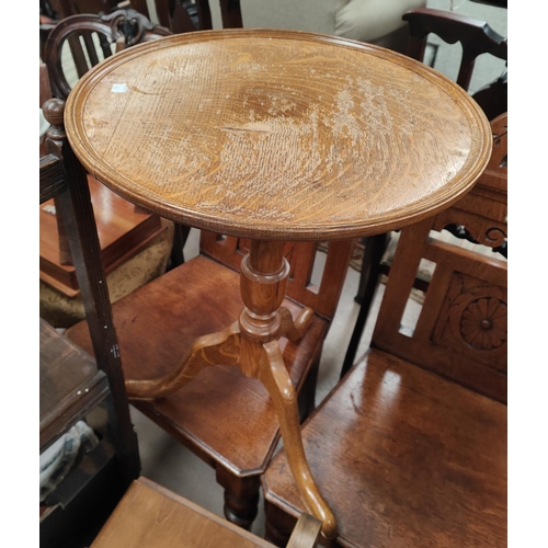 959 - An early 19th century mahogany pedestal occasional table; an oak snap top wine table