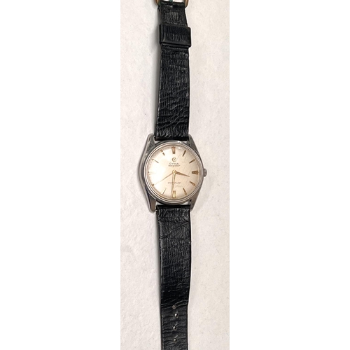 609 - A mid 20th century CYMA Navy Star gents wristwatch in stainless steel case with gilt baton marks on ... 