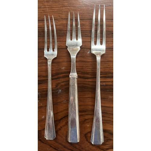 702 - A hallmarked silver canteen of cutlery in Plain Pine pattern by Robert & Belk Ltd for 8 in the A... 