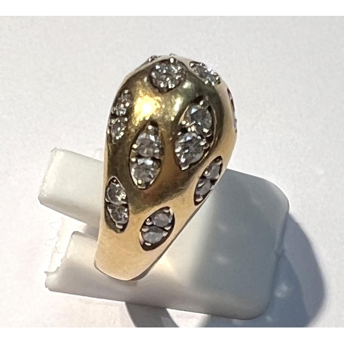 783 - An 18 carat hallmarked gold dress ring set with pairs of diamonds in 12 lozenge shaped insets, 24 di... 