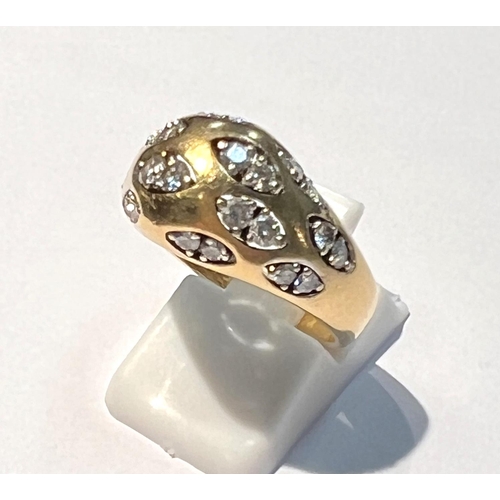 783 - An 18 carat hallmarked gold dress ring set with pairs of diamonds in 12 lozenge shaped insets, 24 di... 