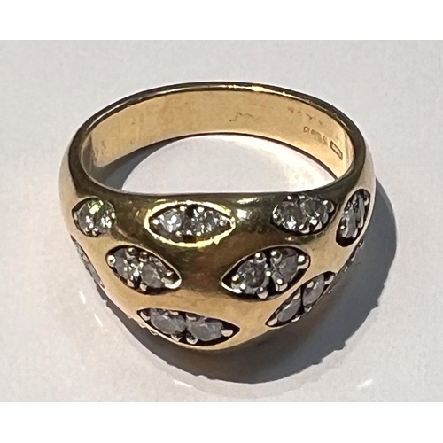 783 - An 18 carat hallmarked gold dress ring set with pairs of diamonds in 12 lozenge shaped insets, 24 di... 