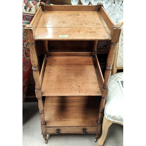 939 - A 19th century 3 height whatnot of square tapering form with base drawer, on turned supports