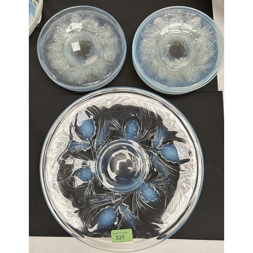 498 - A Lalique style set of 11 opalescent dessert plates decorated with pine cones n relief, diameter 17c... 