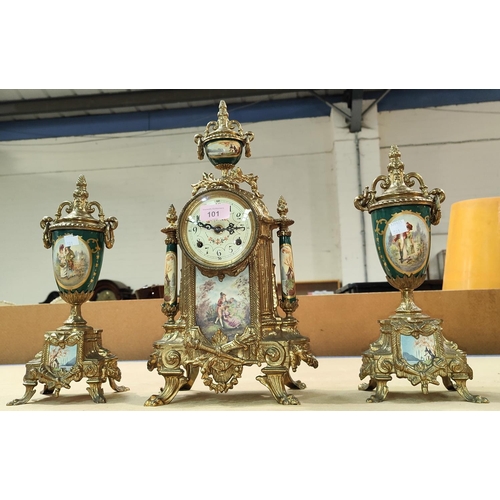 101 - A reproduction French 3 piece clock garniture in gilt metal and porcelain effect