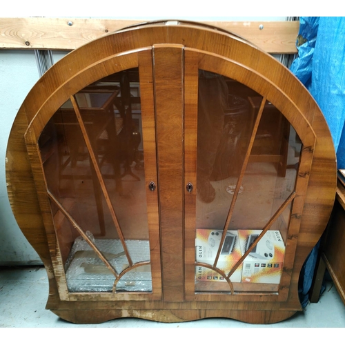 1022 - An Art Deco 'Sunrise' walnut display cabinet of circular form, width 178cm (needs some work, some ve... 