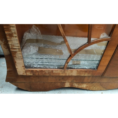 1022 - An Art Deco 'Sunrise' walnut display cabinet of circular form, width 178cm (needs some work, some ve... 