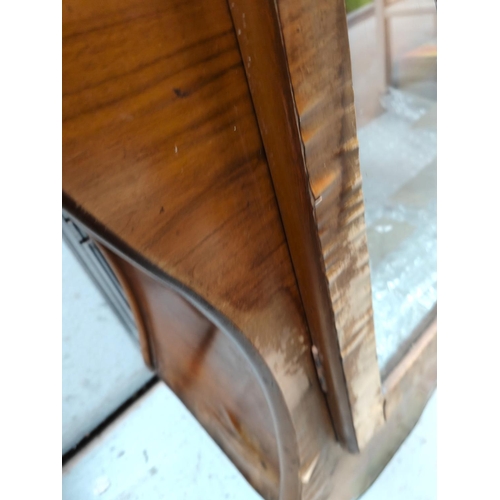 1022 - An Art Deco 'Sunrise' walnut display cabinet of circular form, width 178cm (needs some work, some ve... 