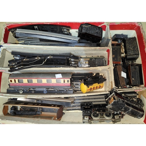 126 - A set of Trix twin rail locomotive, track, rolling stock and scenery