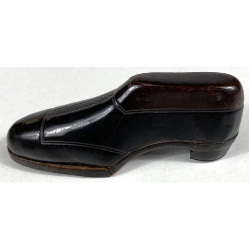 156 - A 19th century miniature apprentice piece leather shoe with incised detail, brass heel, length 11cm