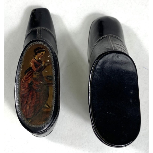 156B - Two 19th century novelty lacquered snuffboxes in the form of shoes, one silver inlaid, one with pict... 