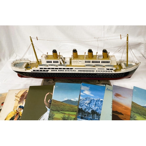 188A - A wooden model of the Titanic and a selection of Cunard cruise menus RMS Queen Elizabeth , Queen Mar... 