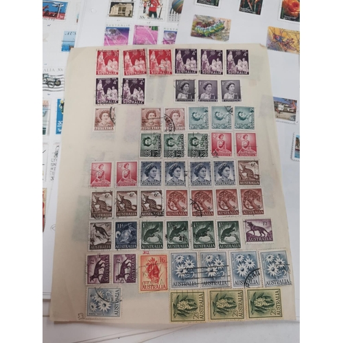 204 - AUSTRALIA: a large selection of stamps on sheetsNo bids sold with next lot