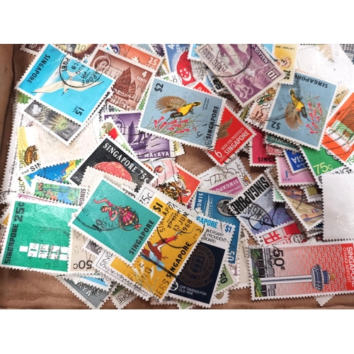 219 - WORLD STAMPS: a selection, loose on trays