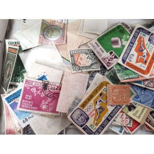 219 - WORLD STAMPS: a selection, loose on trays