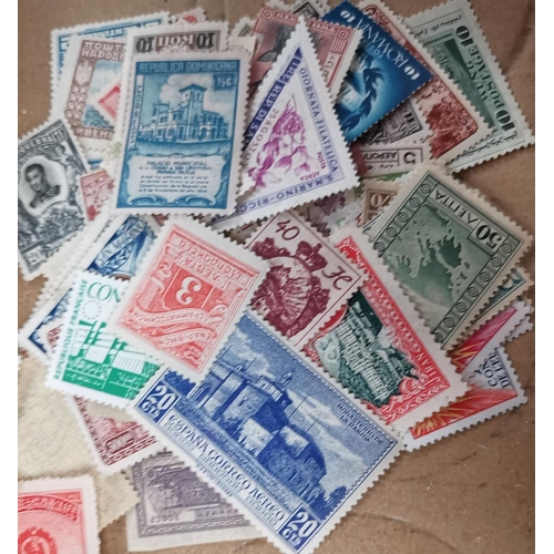 219 - WORLD STAMPS: a selection, loose on trays