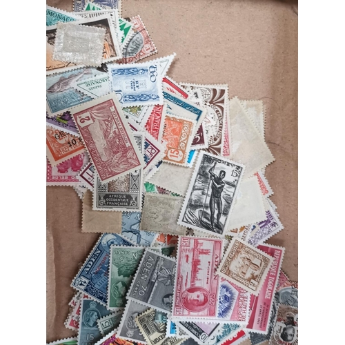 219 - WORLD STAMPS: a selection, loose on trays