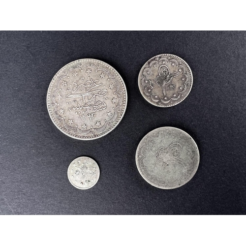 322 - WORLD COINAGE: An Ottoman Empire 1877 Abdul Hamid II 20 Kurush silver coin 24gm; An Ottoman Empire A... 