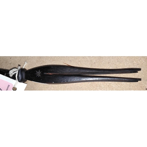40 - A late 19th/early 20th century Fijian cannibal fork in dark wood with four prongs, carved grip with ... 