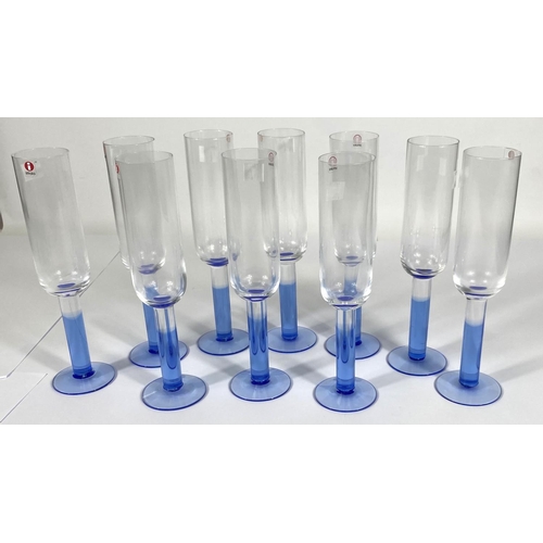 414 - IITTALA: a set of ten Finnish glass Iittala Mondo champagne glasses with light blue stems