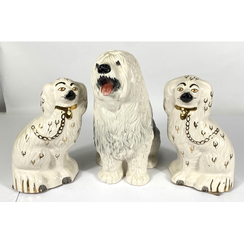 424 - A large Beswick figure of an Old English Sheepdog, (tongue slight chips) ht. 29cm, two Beswick Staff... 