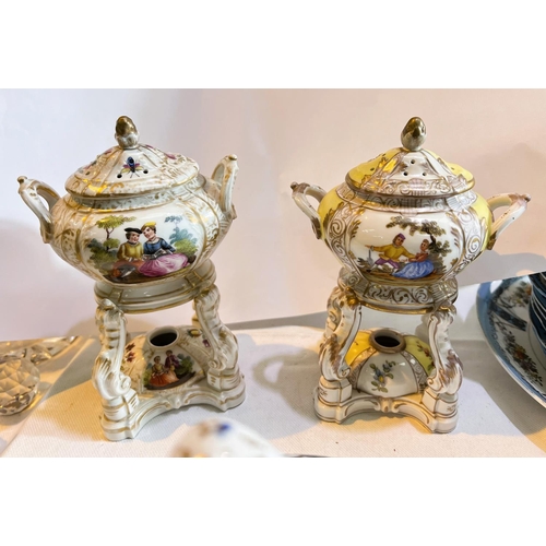 458 - Two Meissen miniature ceramic tea burners with decorated panels, gilt highlights and a similar lidde... 