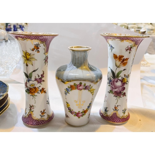 459 - A pair of modern Dresden floral impressed vases, impressed 1081 and another similar vase 