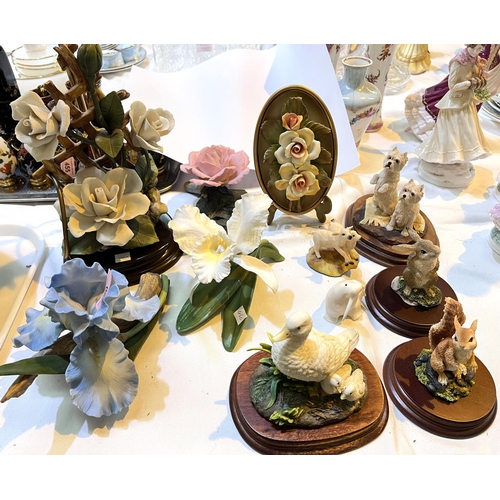 460 - A collection of bisque hand painted flower display, a similar lamp and a similar swan and animals&nb... 