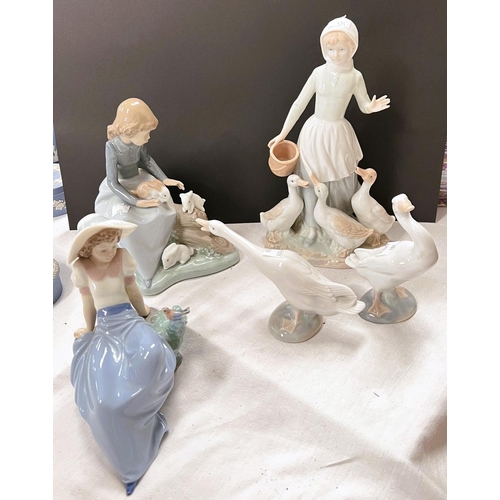 484 - Two Nao groups:  girl with rabbit & girl with bird; a similar group; 2 Lladro geese