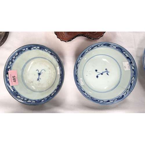 485 - A pair of Chinese 18th century blue and white bowls with scrolling floral underglaze designs, seal m... 