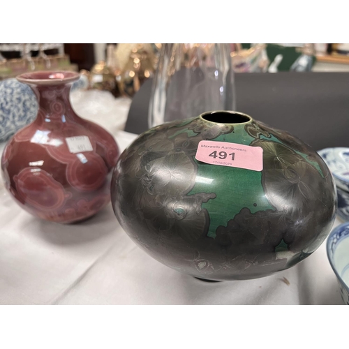 491 - Two ceramic vase and a glass vase