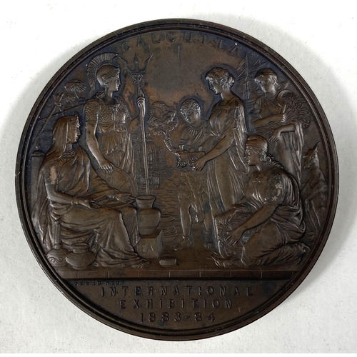 50 - CALCUTTA INTERNATIONAL EXHIBITION, 1883-4 Commemorative bronze medal by WYON, 76mm