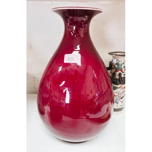 520 - A Chinese Oxblood glazed vase with bulbous body, flared rim, associated stand, ht. 35cm incised mark... 