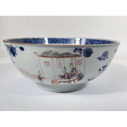 539 - An 18th century Chinese punch bowl with relief polychrome panels to the outside, border to the inter... 