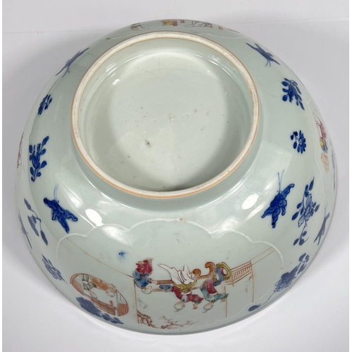 539 - An 18th century Chinese punch bowl with relief polychrome panels to the outside, border to the inter... 