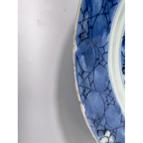 542A - A Chinese Kangxi blue and white plate with floral decoration, leaf mark under, diameter 21cm (minor ... 