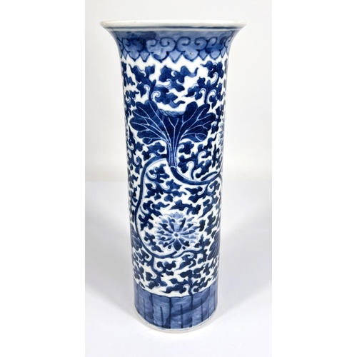 544 - A 19th century Chinese blue and white sleeve vase with scrolling floral decoration, height 30cm