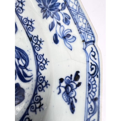 545 - A Chinese blue and white rectangular dish with canted edges, floral vase display, length 32cm