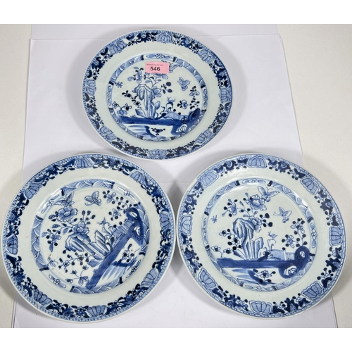 546 - An 18th century Chinese set of 3 blue and white dishes decorated with floral scenes, diameter 23.5cm