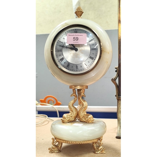 59 - A modern quartz onyx gilt mantle clock