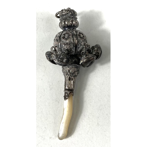 606A - A vintage rattle with mother-of-pearl handle