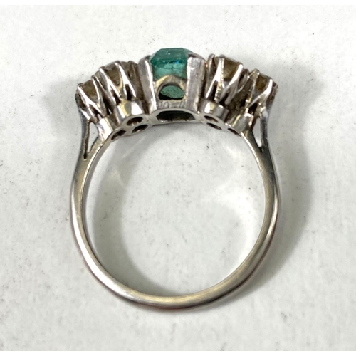 611 - A platinum stamped Art Deco dress ring, square cut emerald approximately 6mm x 6mm with bevelled and... 