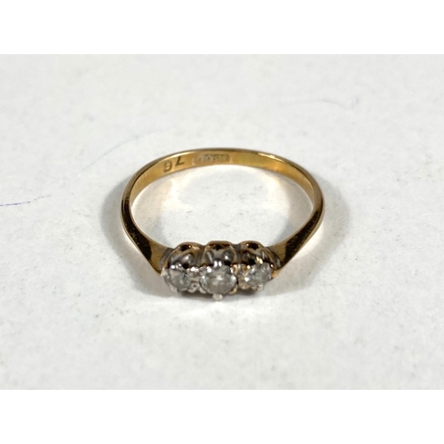 617 - An 18 carat hallmarked gold ring set 3 diamonds, size L, 1.8g