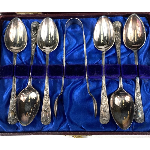 621 - A silver handled boxed carving set, four cased silver plated buckle napkin rings; a cased set of hal... 