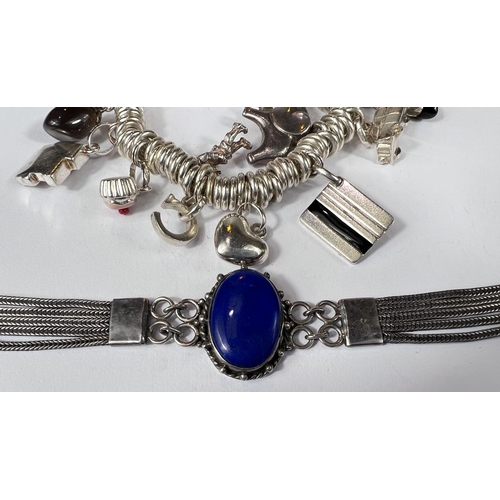 632 - A white metal bracelet with Lapis Lazuli oval stone; a white metal bracelet with hallmarked silver h... 