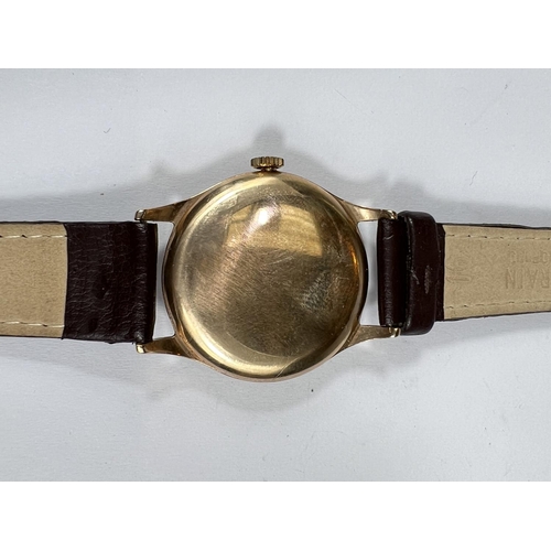 647 - A mid 20th century 9 carat gold cased vintage Roamer Gents wrist watch on later strap