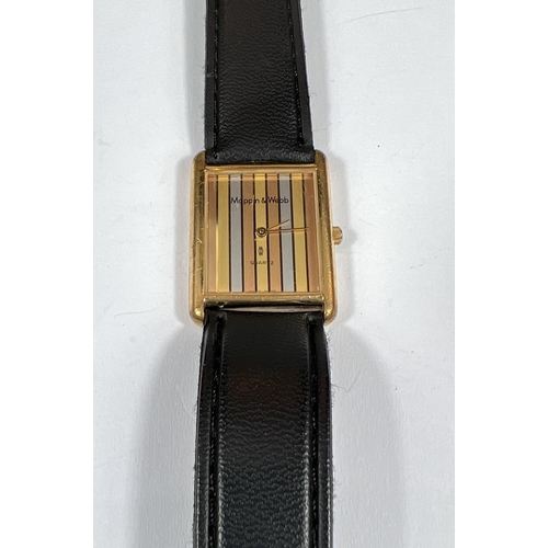 648 - A vintage Mappin and Webb quartz Dress watch with square dial guilt case striped three tone backgrou... 